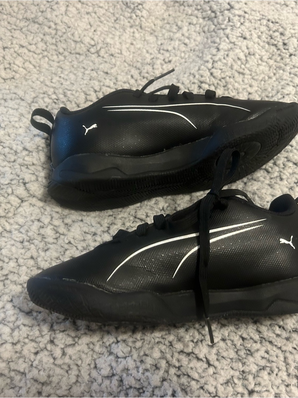 Puma Kids Black Sneakers with White Stripe Accents